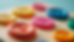 Close-up view of colorful paper squishy buttons arranged on a fidget board