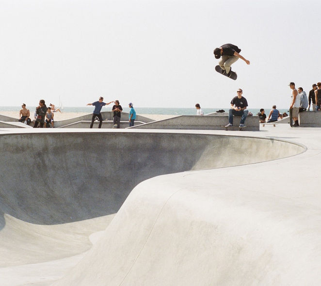 Skateboarder skating a pool