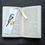 Thumbnail: Long Tailed Tit laminated bookmark with tassel by Alan Taylor Art