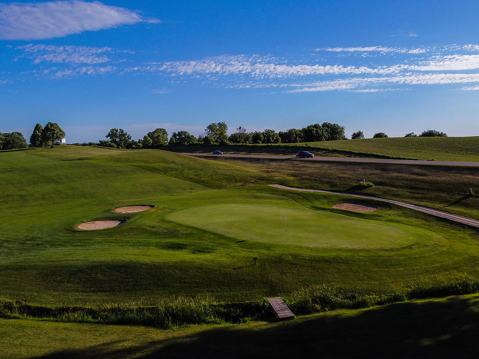The fifth hole at Southern Hills is a fun one. A short Par 4 that you can drive the green on if you catch the hill, but if you bail out right, you are left with a tough shot taking on the bunkers and with a creek right.