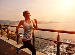 Girl Running by the Sea