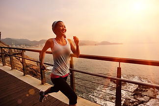 Girl Running by the Sea
