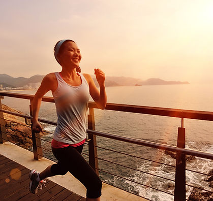 Girl Running by the Sea