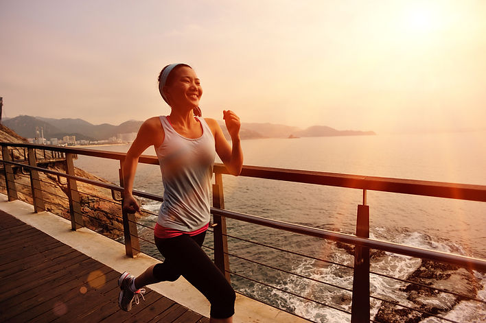 Girl Running by the Sea