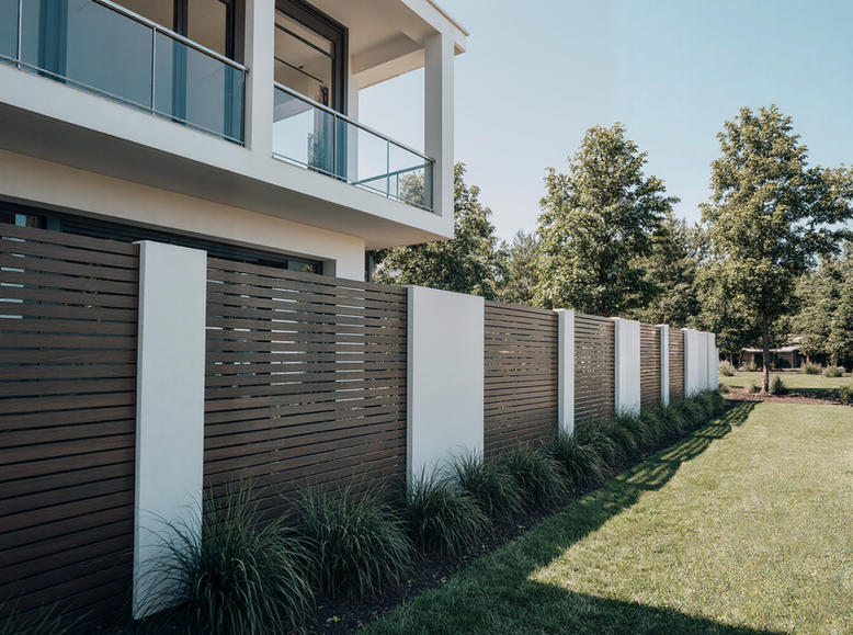 modern fence in front of a residence