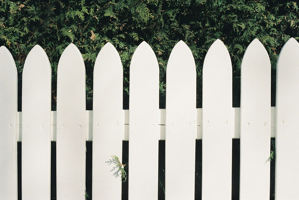Designing Custom Fence Installation for Sloped Northwest Yards