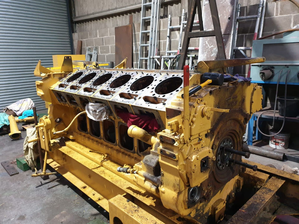 large yellow and grey machinery part