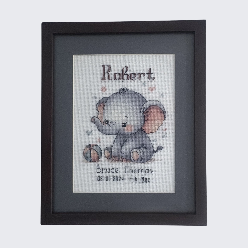 Embroidery of personalized birth announcement. This makes a great newborn or baby gift.