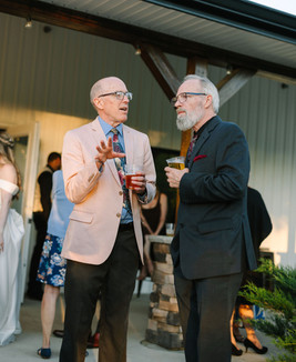 Guests celebrating on the dance floor at Creekside Acres Event Barn in Goodrich, MI.