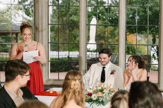 Pine Knob Mansion ballroom decorated with warm fall wedding colors