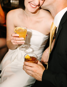 Cozy bar engagement photos in Detroit with vintage cocktail lounge aesthetic