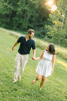 Just-engaged couple hugging at Nichols Arboretum in Ann Arbor, Michigan
