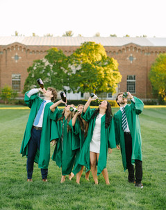 Michigan State senior photos with champagne pop on campus