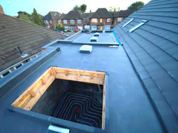 Complex Full Roof with multiple levels, Skylight and hidden gutter system