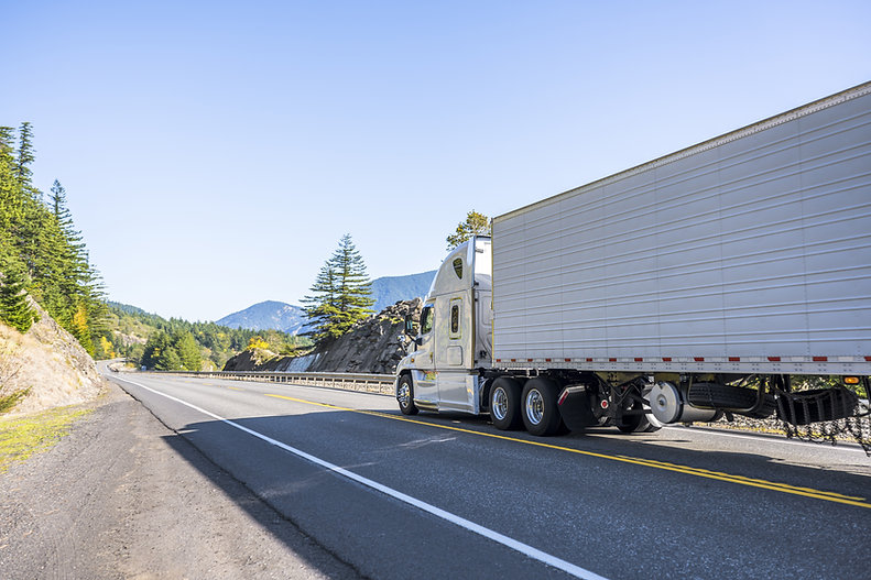 semi truck transporting.jpeg