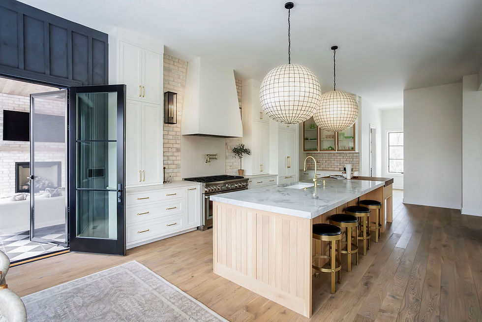 Spacious kitchen with large island and open doors