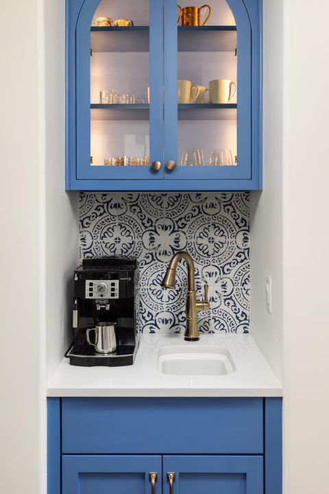 Blue built-in coffee station with espresso maker and sink