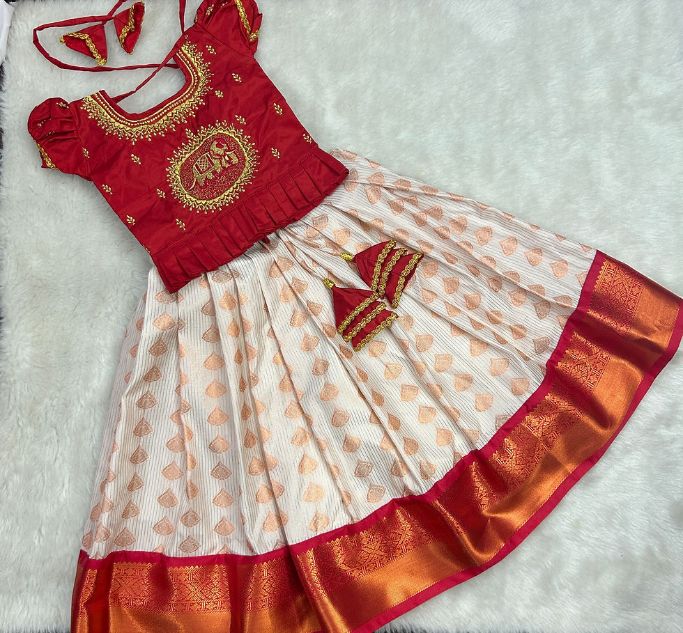 Beautiful Kanchipuram pattu pavadai paired with beautiful hand embroider