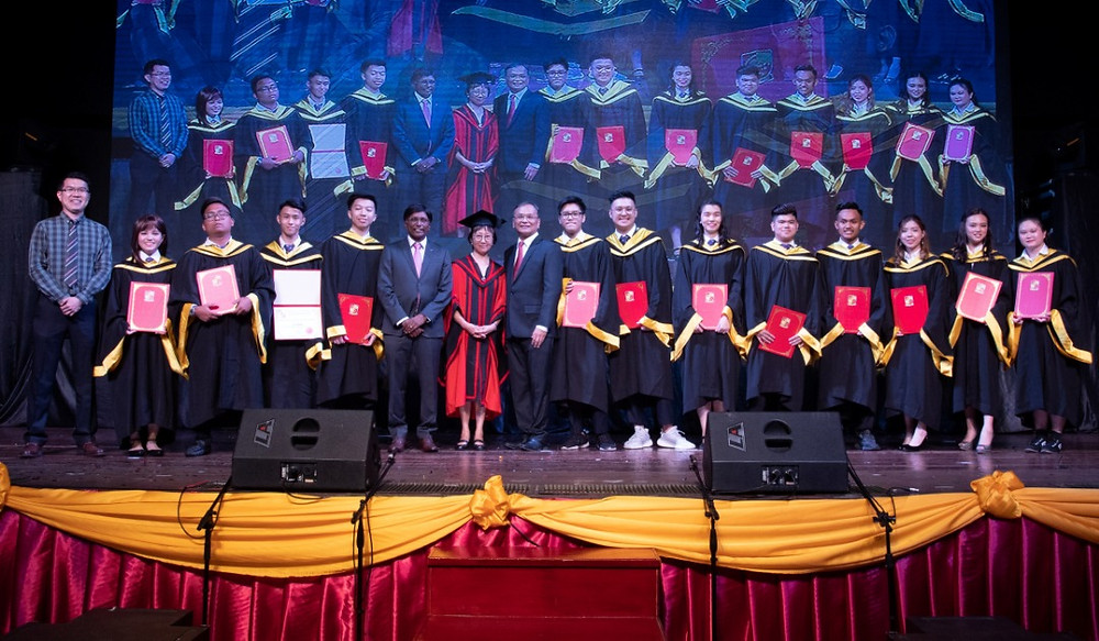 High school graduates “reluctantly” sang their graduation song, saddened with thoughts of imminent separation