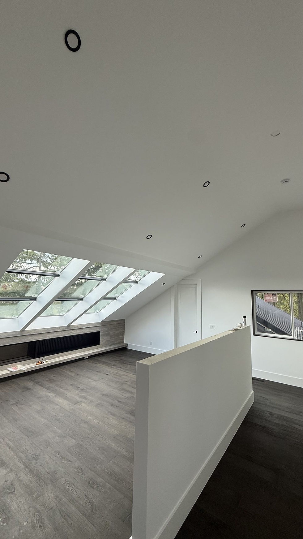 Smooth white walls and ceiling in the attic room