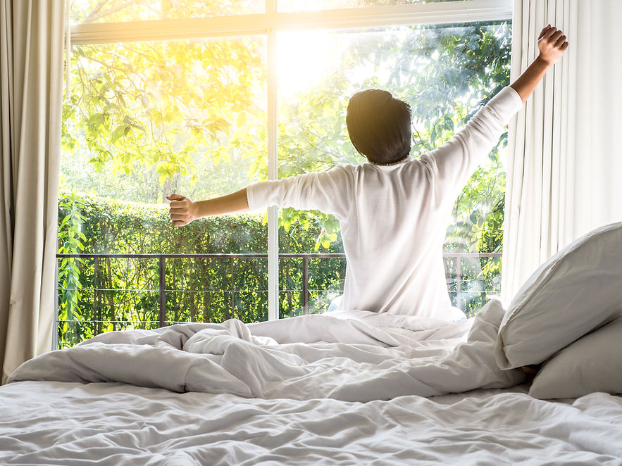 lazy-man-happy-waking-up-bed-rising-hands-morning-with-fresh-feeling.jpg
