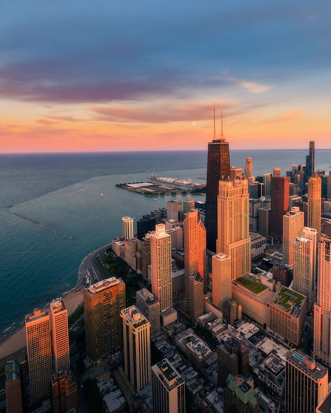 Aerial View of North Part of Chicago at Sunset with Lake Michigan.jpg