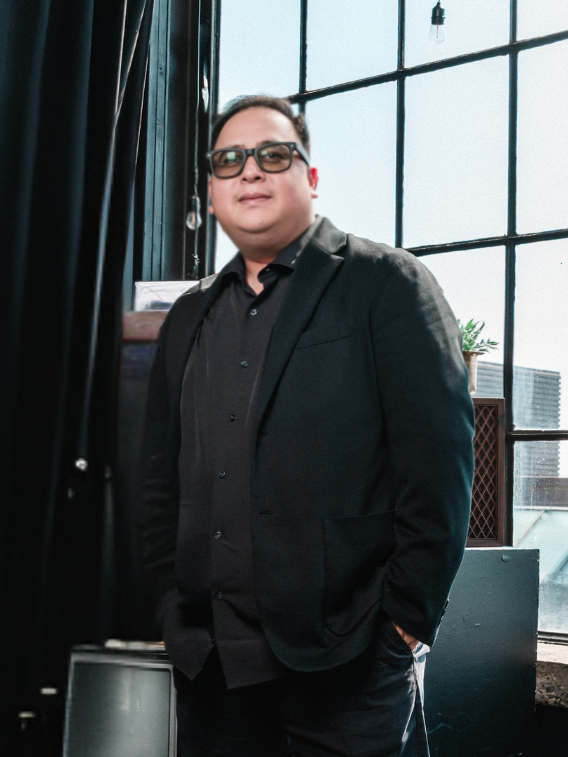 Richard, The AC Project's Keyboardist in black suits