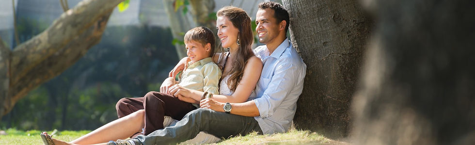 Happy Family Under a Tree