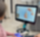 Orthodontist performing a digital dental scan with the iTero scanner for Invisalign treatment planning