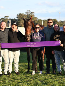 TRAINERS' TREBLE AT HOME