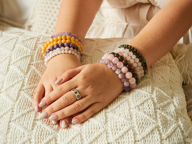 hands-woman-craftswoman-with-several-multi-colored-handmade-bracelets-her-hands.jpg