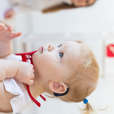 Baby with Hearing Aid_edited.jpg