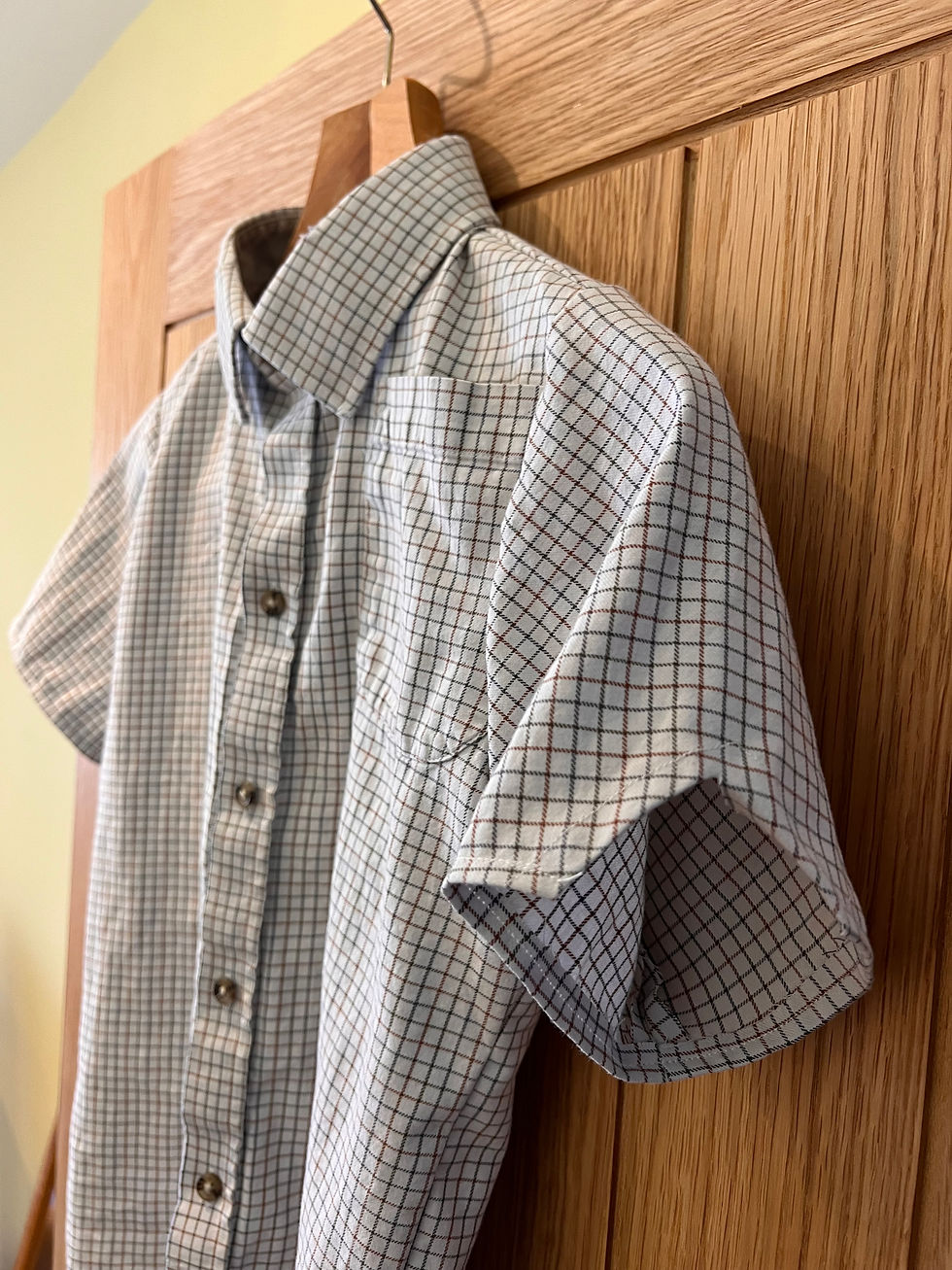 Clothing as Memory: How a father’s old shirt becomes a child’s play outfit.