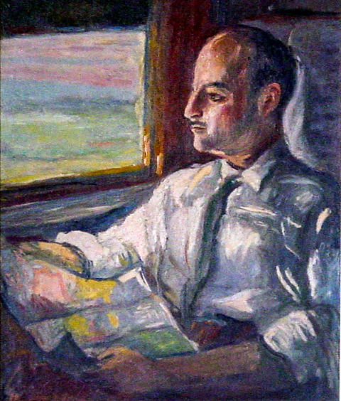 Javier en tren con mapa.jpg