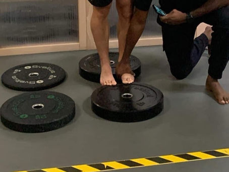 What is the benefit of strengthening the intrinsic muscles of the foot through functional exercises?