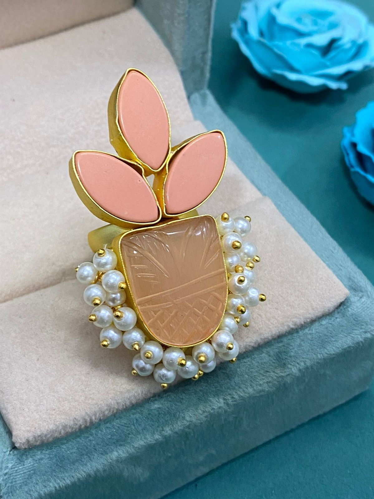 Gold Ring with Pink Engraved Stone