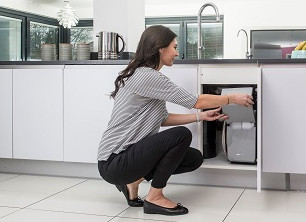 Woman loading Kinecto Premier Compact