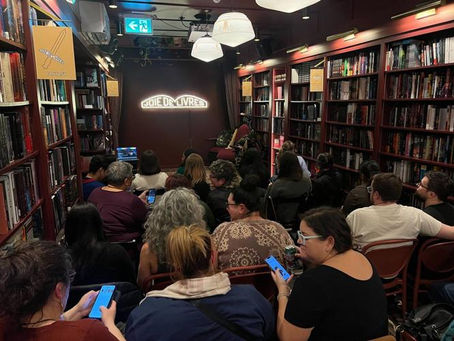 Fans of the series "Heated Rivalry' met in Montreal at the independent bookstore Joie de livres to watch the show's first episode as a group on Sunday, Jan. 11, 2026. THE CANADIAN PRESS/Charlotte Glorieux