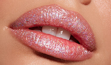closeup-glossed-lips-with-iridescent-glitter-pastel-pink-hue.jpg