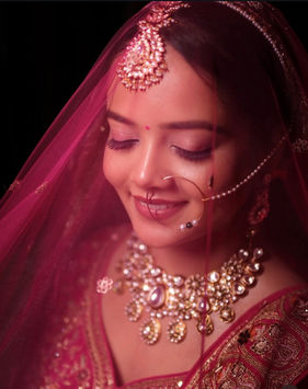Bridal makeup and hairstyle styling for wedding ceremony at Honey Salon Chhatarpur.
