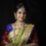 Bridal makeup by Pooja Makeup Artist in Pune with glowing skin and nude lips