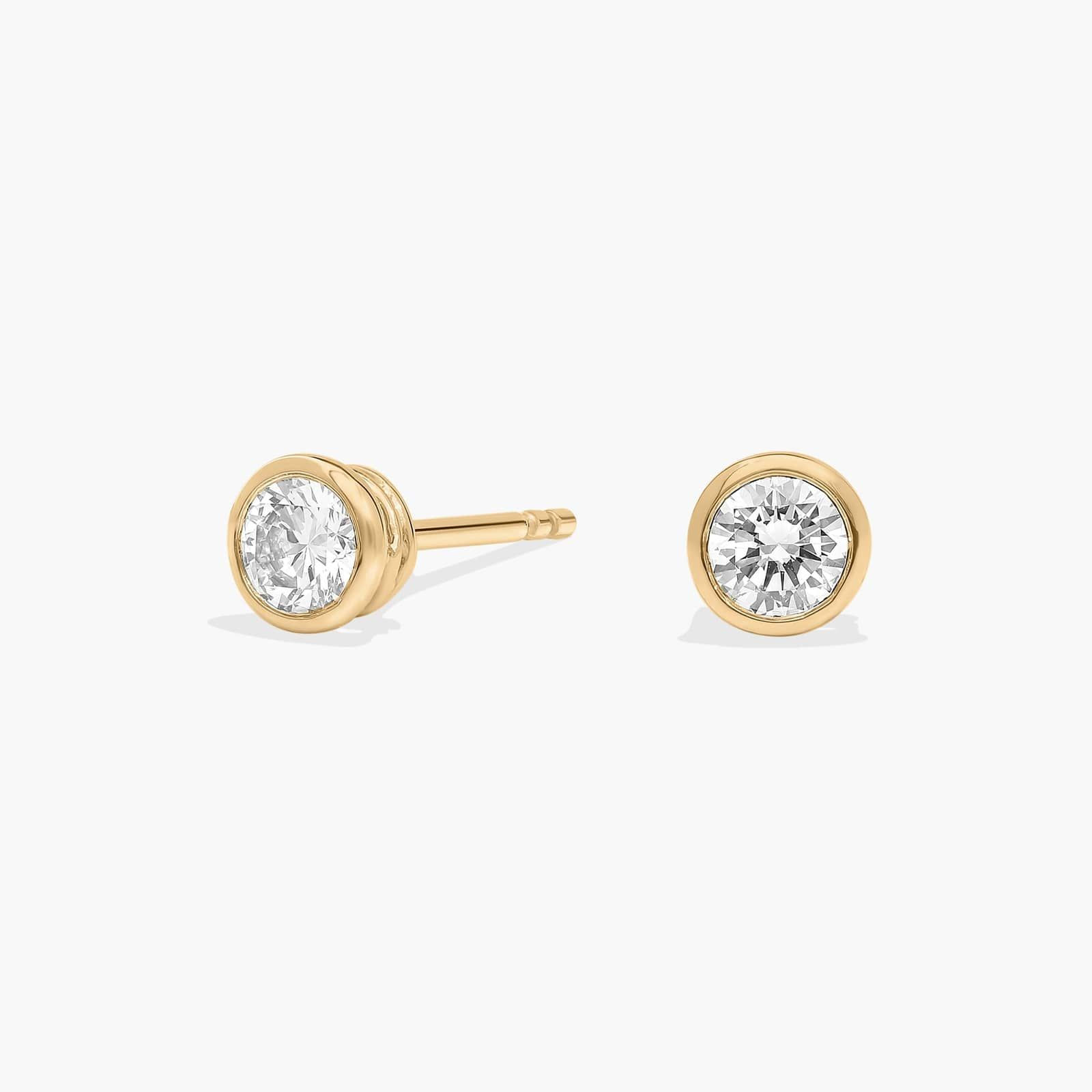 .50 TW Pure North Round Brilliant Bezel Set Earrings