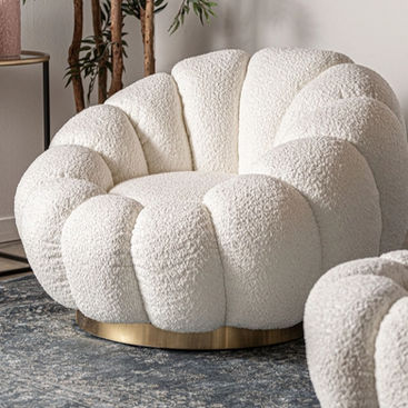 White large pouf in boucle with a olden base.