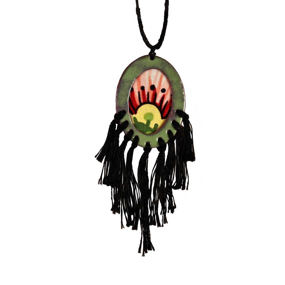 green oval with pink red and yellow on the inside and black tassels on the bottom