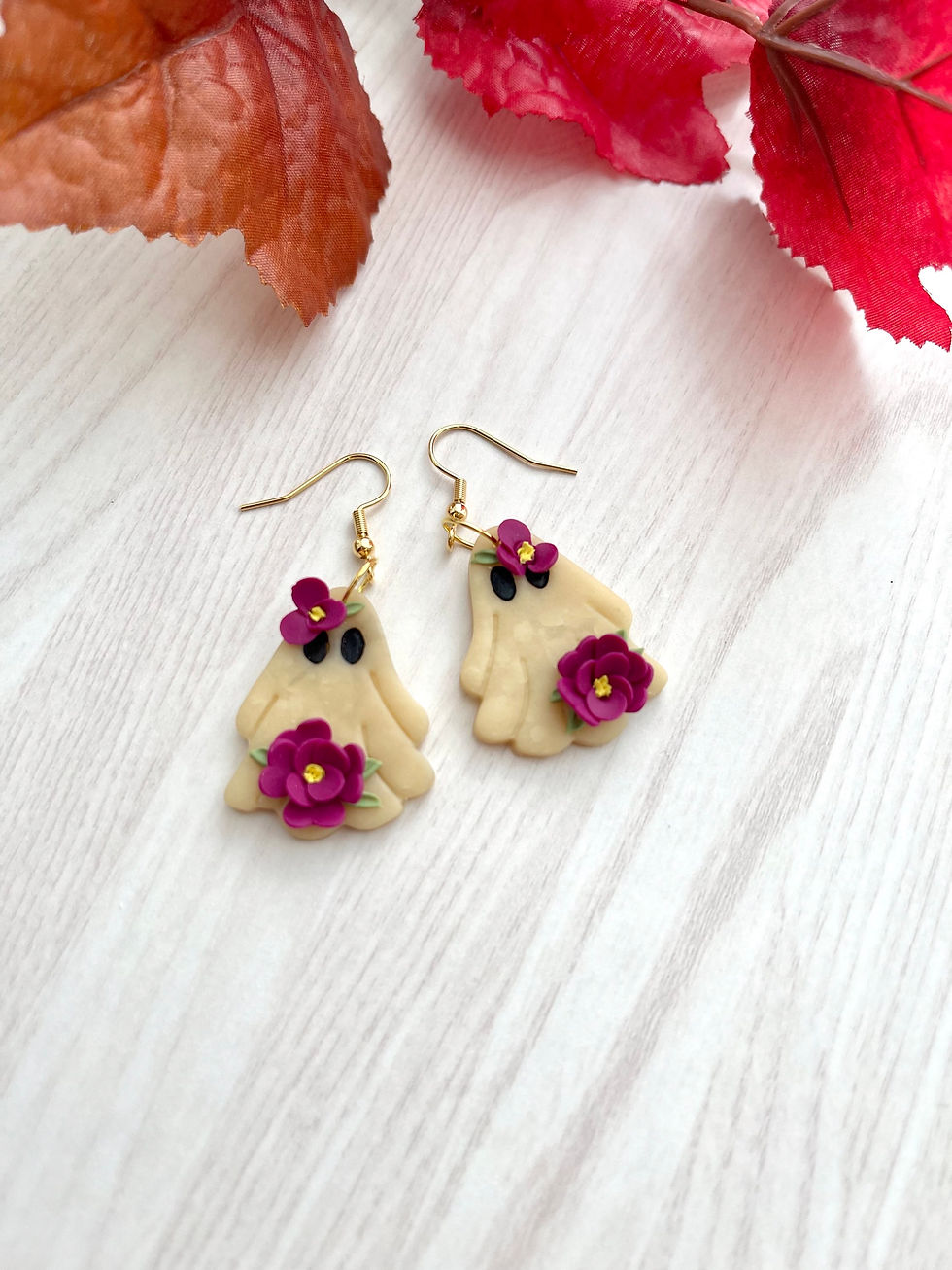 Thumbnail: Glow in the dark floral ghost earrings