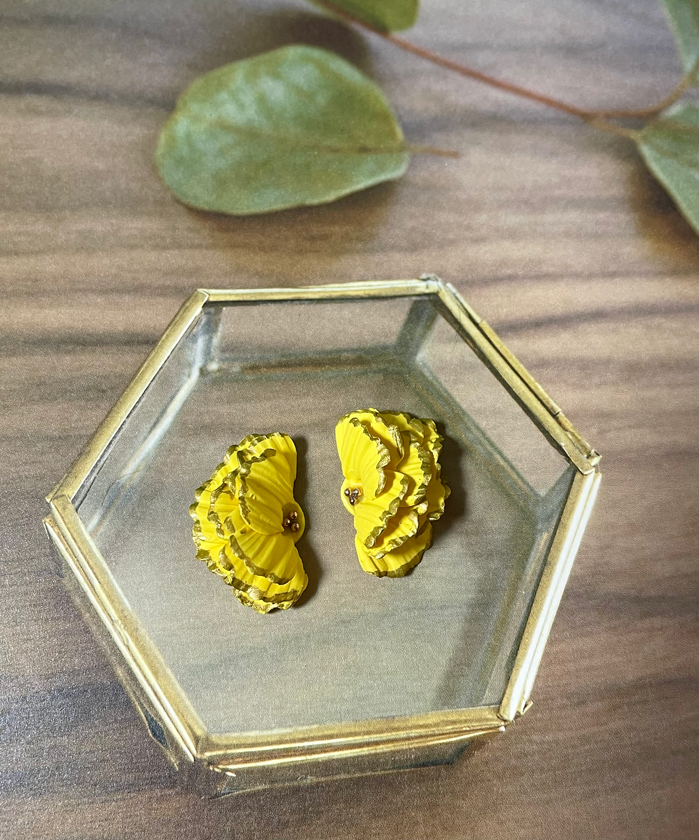 Thumbnail: Half flower ear studs