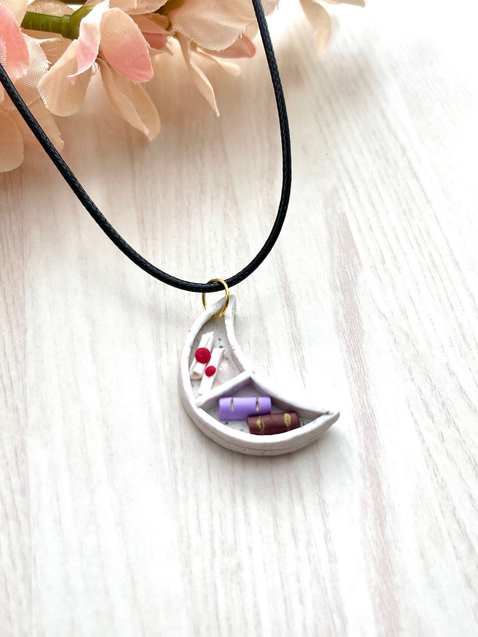 Thumbnail: Moon book shelf necklace 