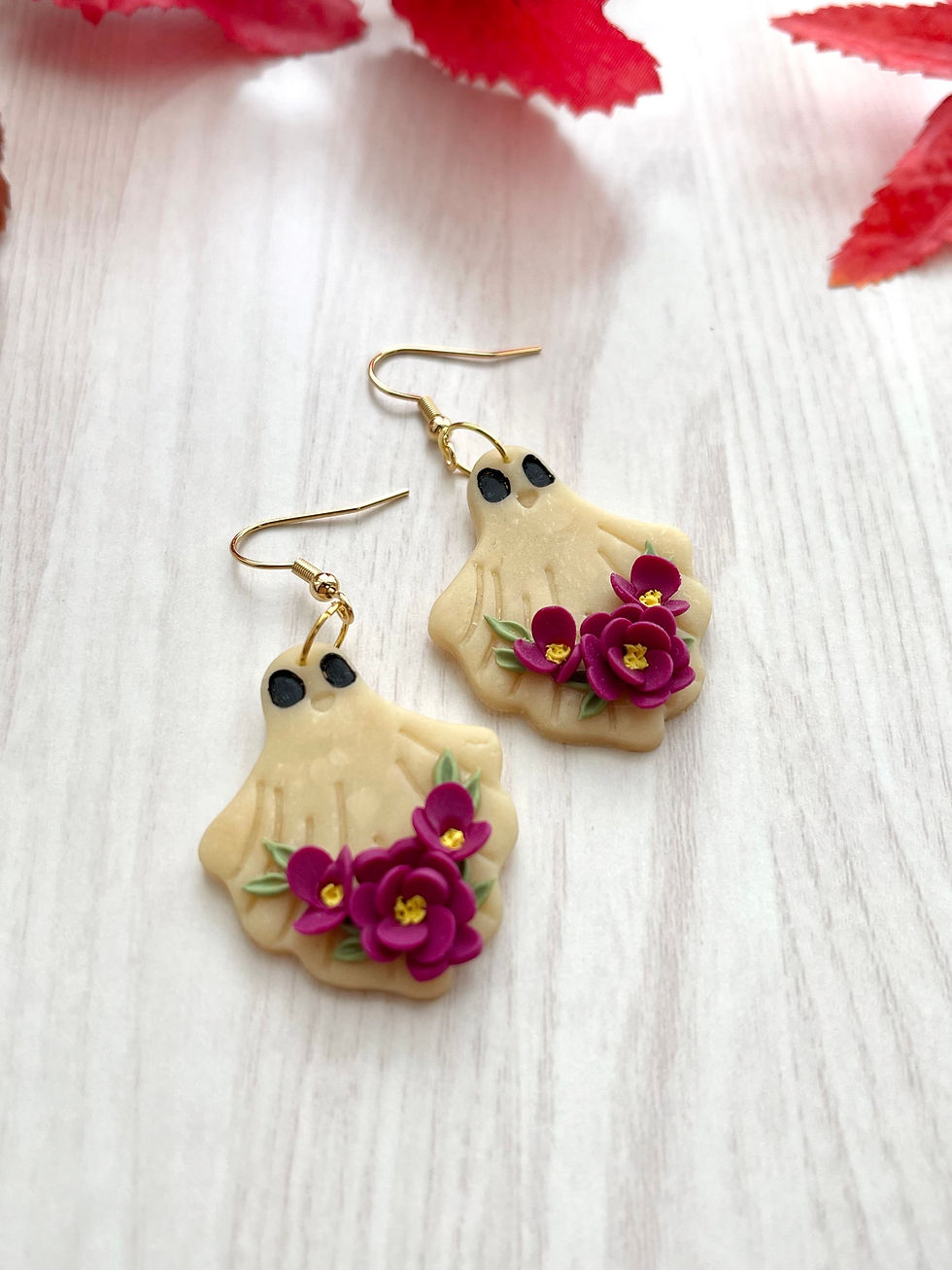 Thumbnail: Glow in the dark floral ghost earrings