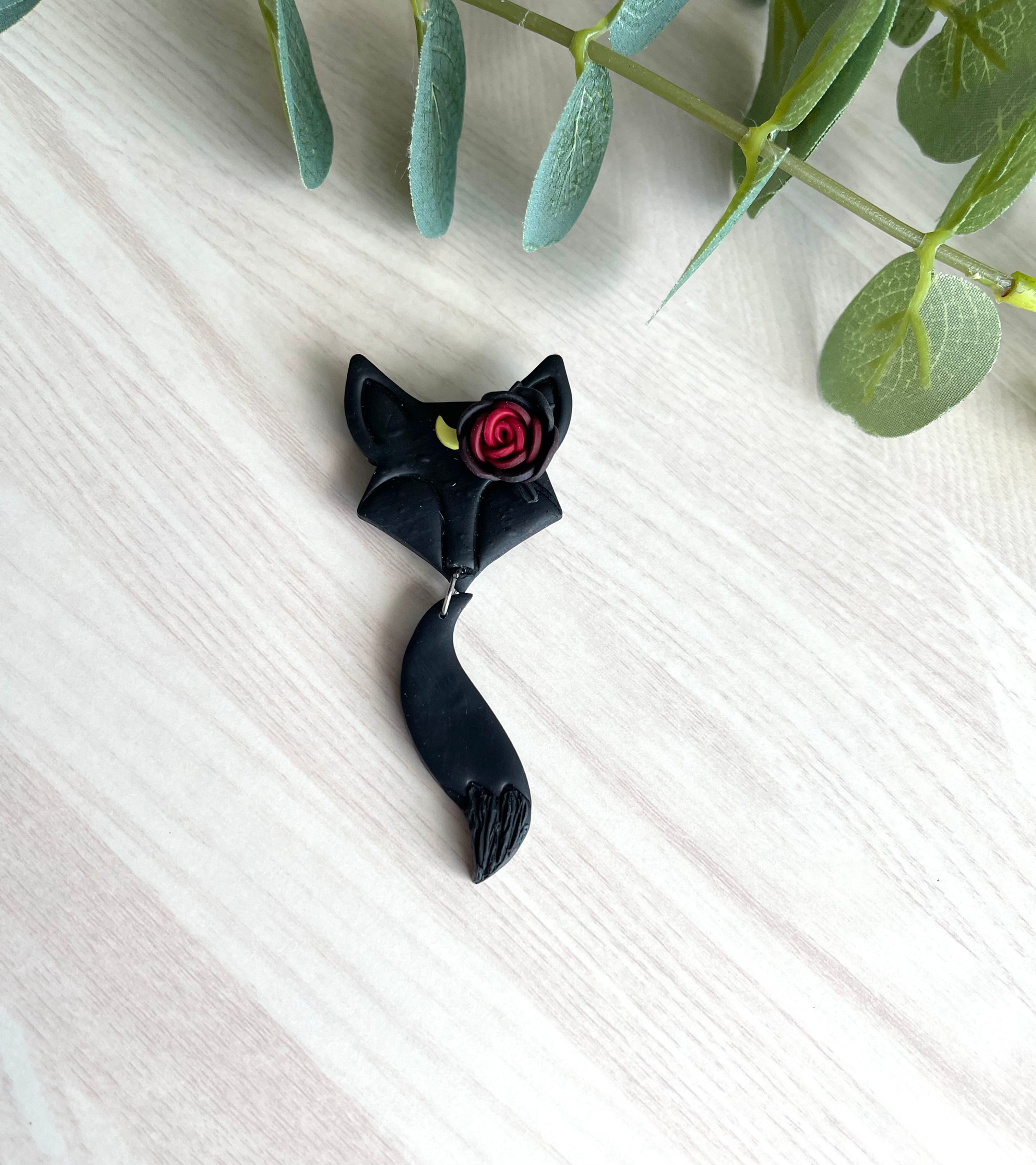 Black fox brooch 