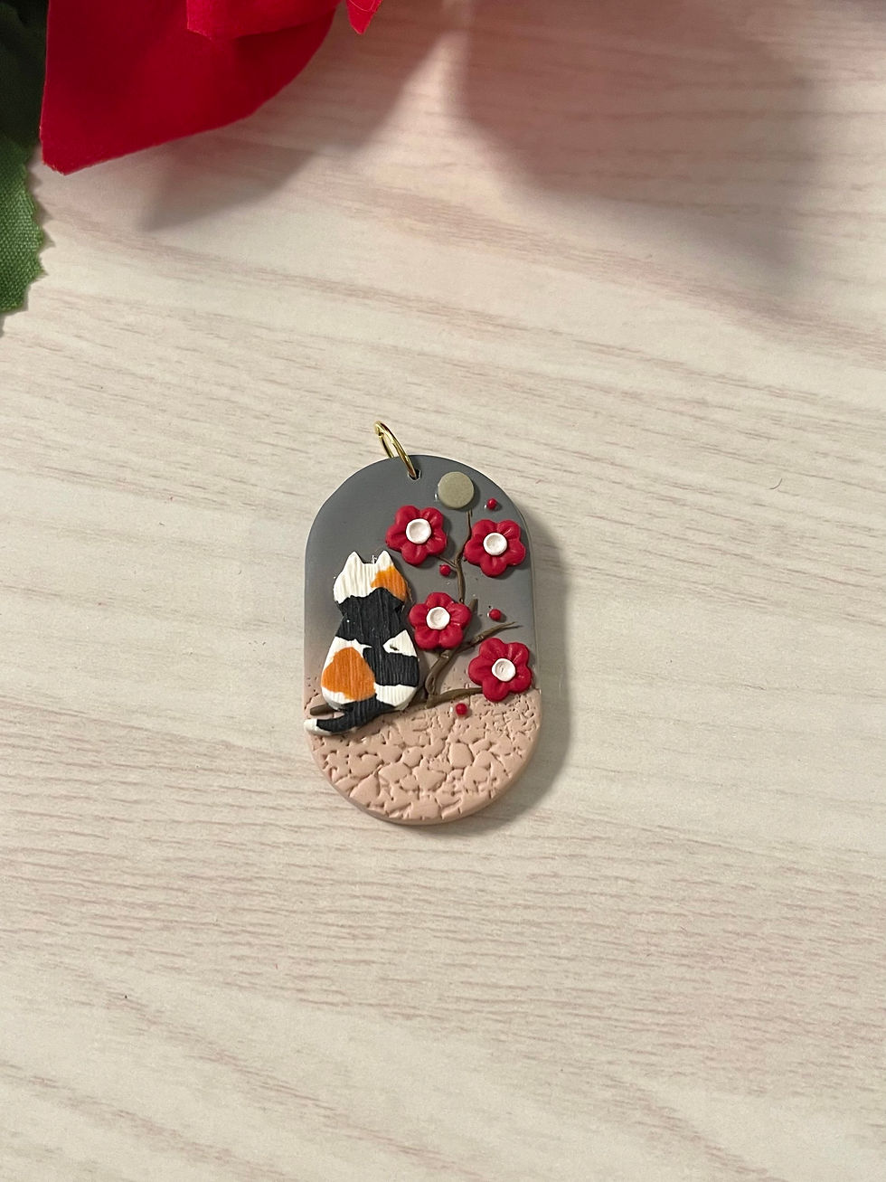 Thumbnail: Cat and plum blossom pendant